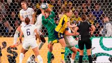 US goalkeeper Alyssa Naeher grabs the ball in front of her goal.