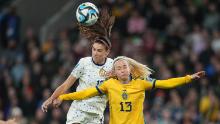 Morgan and Ilestedt go up for a header.