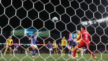 Sweden's Amanda Ilestedt scores the first goal of the quarterfinal match against Japan.