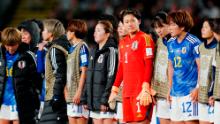 Japanese players react following the loss to Sweden.