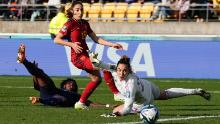 Spanish goalkeeper Cata Coll and defender Olga Carmona watch as a shot from the Netherlands' Lineth Beerensteyn goes wide during extra time.