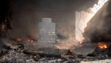 Fires burn after the blast on August 14.
