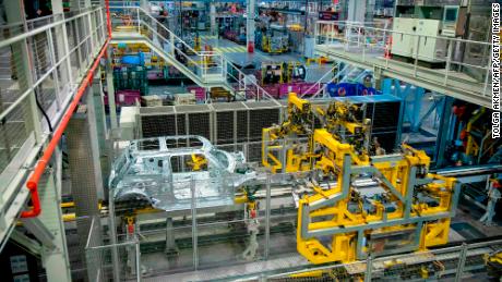 Robots work on the Mini production line at the BMW plant in Cowley, near Oxford.