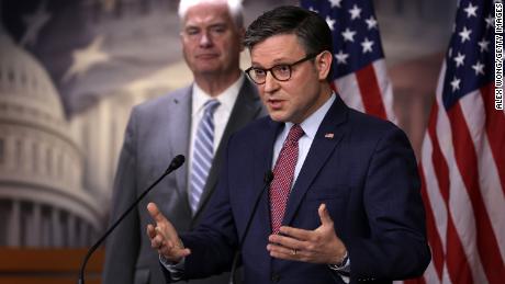 WASHINGTON, DC - NOVEMBER 02:  U.S. Speaker of the House Rep. Mike Johnson (R-LA) (R) speaks as House Majority Whip Rep. Tom Emmer (R-MN) (L) listens during a news briefing at the U.S. Capitol on November 2, 2023 in Washington, DC. House Republican held a Conference meeting to discuss party agenda.  (Photo by Alex Wong/Getty Images)