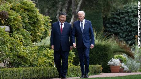TOPSHOT - US President Joe Biden (R) and Chinese President Xi Jinping walk together after a meeting during the Asia-Pacific Economic Cooperation (APEC) Leaders&#39; week in Woodside, California on November 15, 2023. Biden and Xi will try to prevent the superpowers&#39; rivalry spilling into conflict when they meet for the first time in a year at a high-stakes summit in San Francisco on Wednesday. With tensions soaring over issues including Taiwan, sanctions and trade, the leaders of the world&#39;s largest economies are expected to hold at least three hours of talks at the Filoli country estate on the city&#39;s outskirts. (Photo by Brendan Smialowski / AFP) (Photo by BRENDAN SMIALOWSKI/AFP via Getty Images)