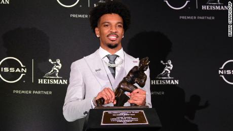 December 9, 2023, New York, New York, U.S: Louisiana State University quarterback, Jayden Daniels poses with the Heisman Trophy during the post Heisman Trophy award conference at the Marriott Marquis Hotel in New York, New York. (Cal Sport Media via AP Images)