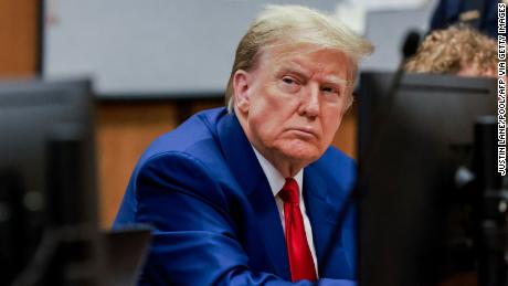 Former US President Donald Trump attends a hearing to determine the date of his trial for allegedly covering up hush money payments linked to extramarital affairs, at Manhattan Criminal Court in New York City on March 25, 2024. Trump faces twin legal crises today in New York, where he could see the possible seizure of his storied properties over a massive fine as he separately fights to delay a criminal trial even further. (Photo by JUSTIN LANE / POOL / AFP) (Photo by JUSTIN LANE/POOL/AFP via Getty Images)