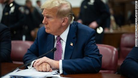Former president and Republican presidential candidate Donald Trump sits in courtroom during his criminal trial at Manhattan Criminal Court on April 19 in New York City. 