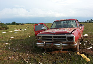 A truck was among the items damaged at the end of the tornado's route.