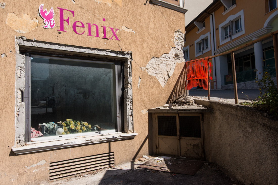 An abandoned shopfront on the south end of L’Aquila where damage was concentrated in student housing.