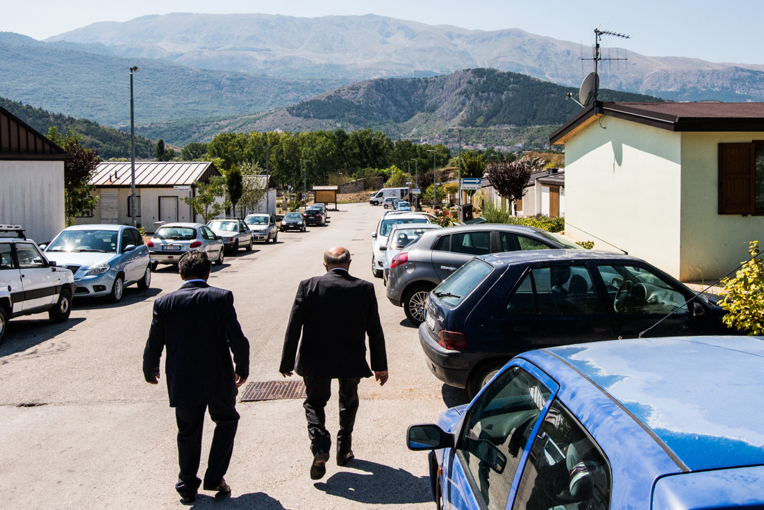 Two men stroll down the thoroughfare of Friuli Venezia Giulia, where the community of Fossa has relocated.