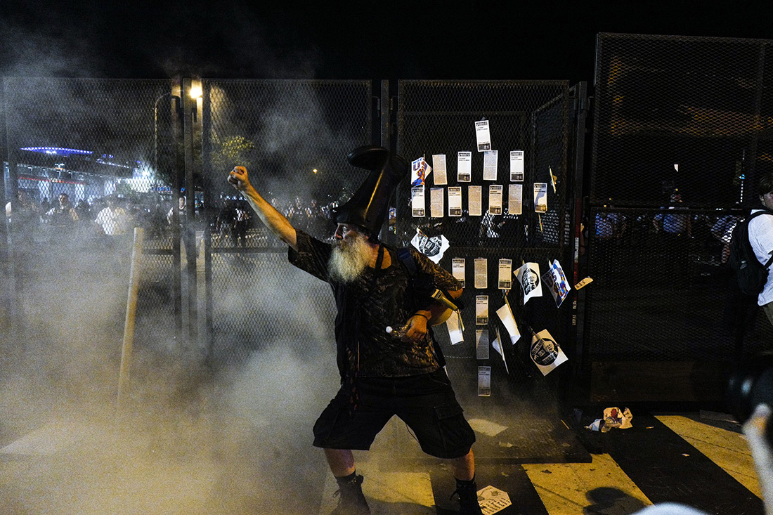 An activist named Vermin Supreme protests outside the Democratic convention. He also protested at the Republican convention.