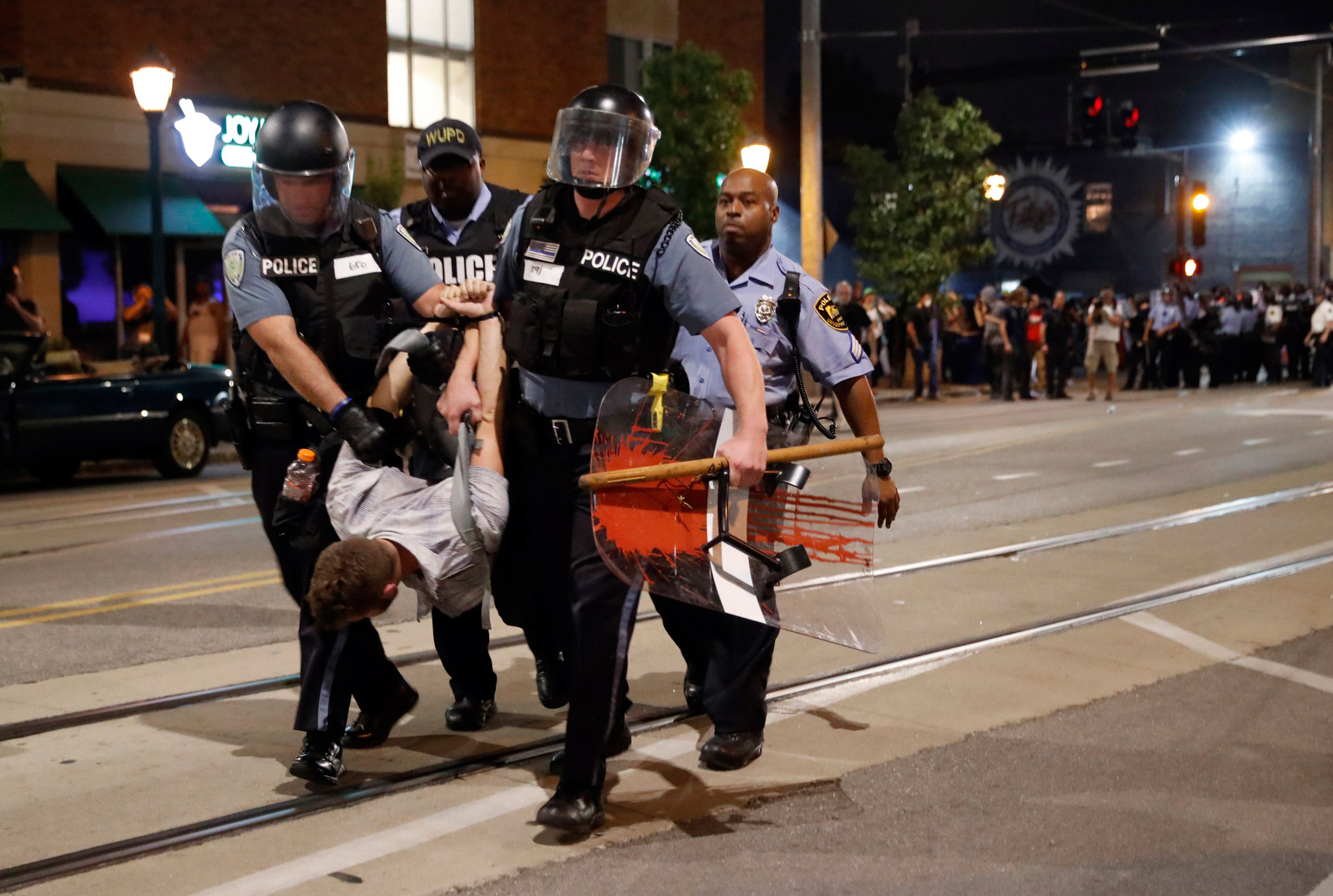 Police arrest a man on Saturday. 