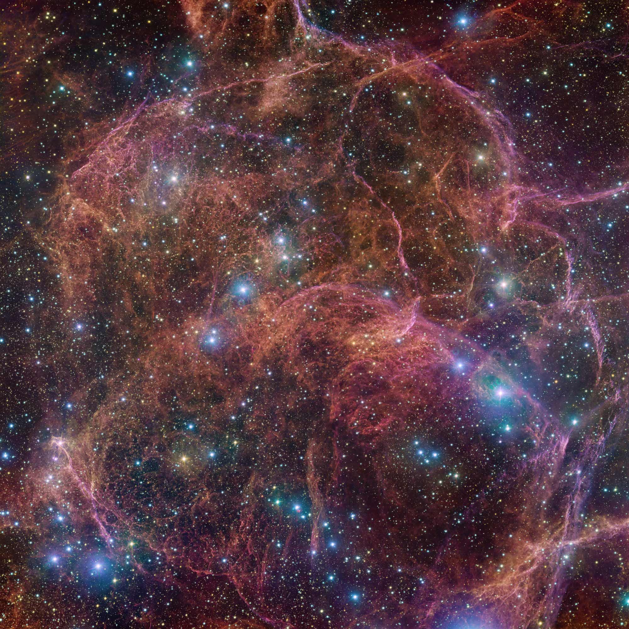 Orange and pink gas clouds make up the <a href="https://www.cnn.com/2022/10/31/world/ghost-star-supernova-scn/index.html" target="_blank">Vela supernova</a> remnant, all that remained after the explosive death of a massive star in this image released by the European Southern Observatory on October 31.