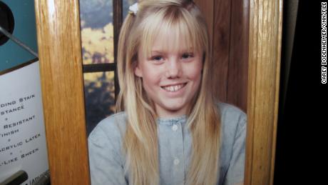 A picture of Jaycee Dugard before she was kidnapped sits framed in her stepfather's home.