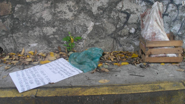 Five severed heads are placed in a sack and left on a suburban street in Acapulco, Mexico, on September 27, 2011.