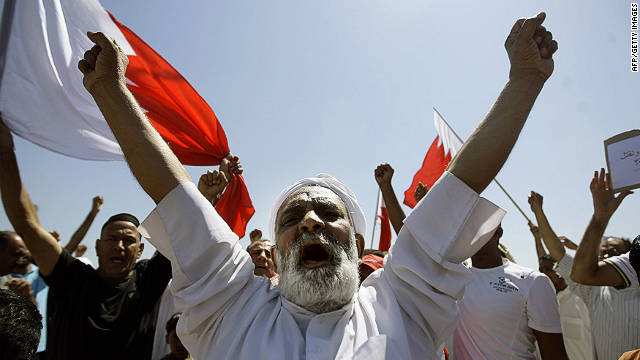 Bahraini Shiite mourners chant slogans during the funeral of a man killed during anti-government demonstrations in March. 