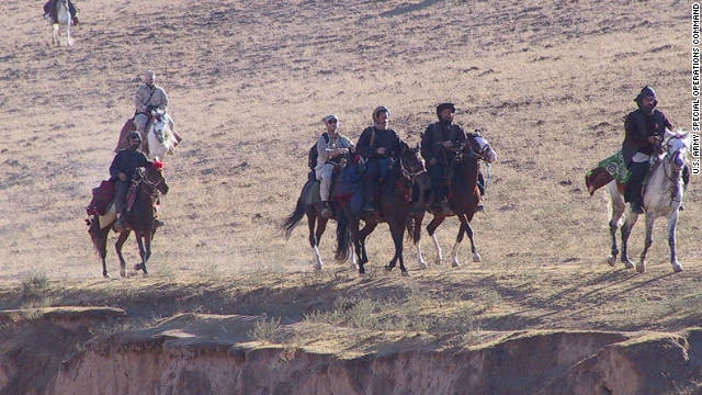 U.S. Special Operations Forces ride into northern Afghanistan in October 2001 on horseback
