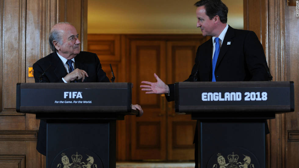 &quot;It is a sad day for football,&quot; FIFA president Sepp Blatter, pictured here meeting British Prime Minister David Cameron a week earlier, tells reporters in Zurich. 