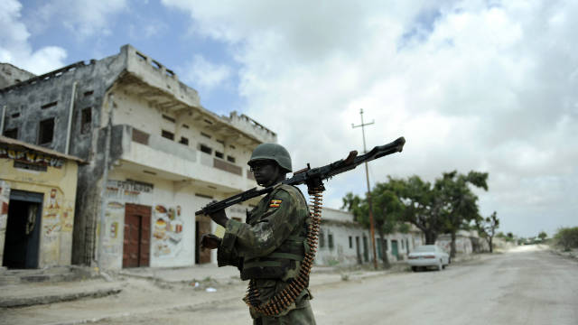 An officer of the African Union peacekeeping force in Somalia mans a frontline position in Mogadishu on October 5, 2011.