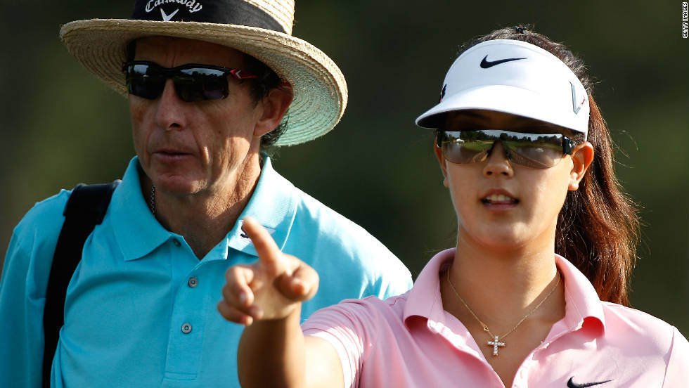 Seen here with former child prodigy Michelle Wie in 2010, Leadbetter has established coaching academies around the world.