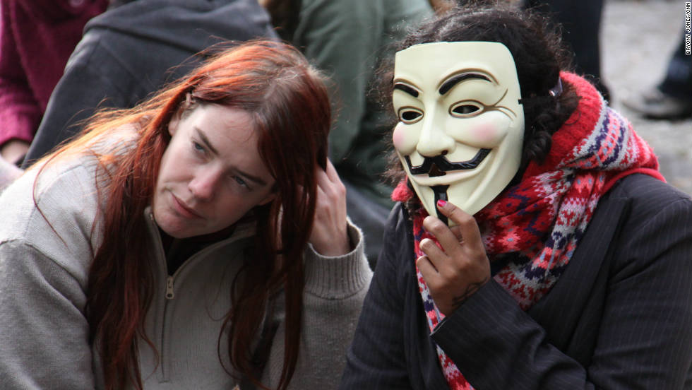 Another protester sports the mask, made famous by the film &quot;V for Vendetta,&quot; at the Occupy London demonstration at St Paul&#39;s Cathedral.