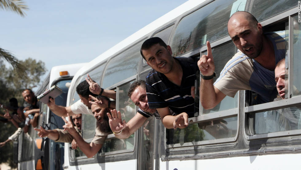 Palestinian prisoners cross to the southern Gaza Strip after being released from Israeli prisons. 