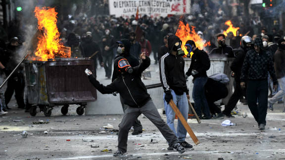 Greek lawmakers pass new austerity law despite protests - CNN Business