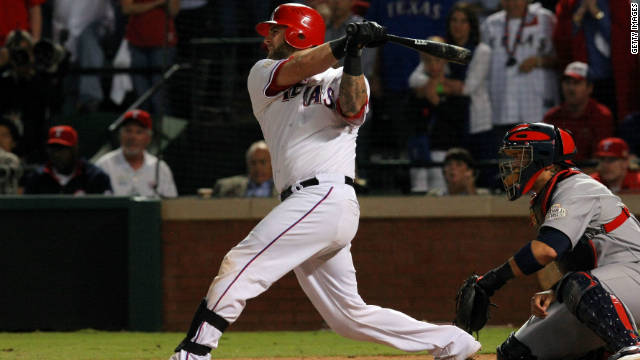 Mike Napoli hits a two-run double to put the Rangers 4-2 up in game five of baseball&#39;s World Series.