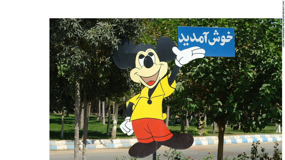 Mickey Mouse welcomes visitors to Tehran&#39;s Eram Park.