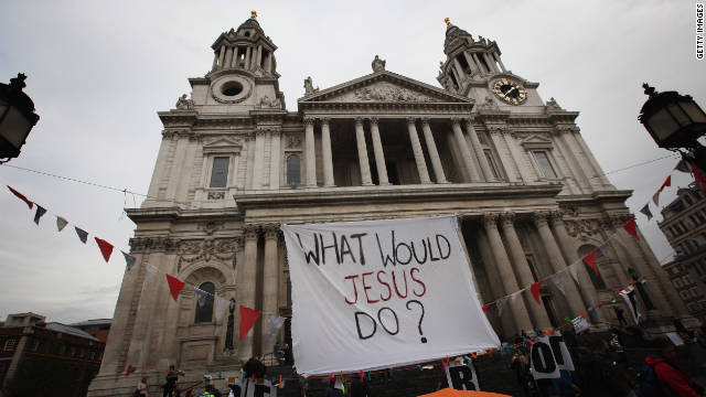 Protestors from the &#39;Occupy London Stock Exchange&#39; demonstrate outside St Paul&#39;s Cathedral on October 22. 