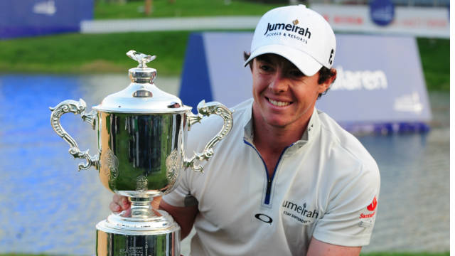 Rory McIlroy proudly shows off the Shanghai Masters trophy, which is accompanied by a cheque for a cool $2 million.