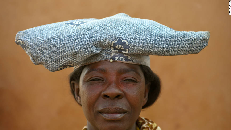 The traditional hat that the Herero wear represents the horns of cattle, an animal of significant importance to them. 
