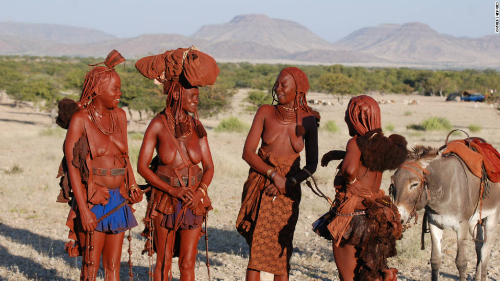 The Herero used to belong to the same group as the Himba (pictured) but German missionaries influenced their style of clothing. The Herero worked for the Germans and were forced to cover up to fit in with their modest Victorian attitudes. 