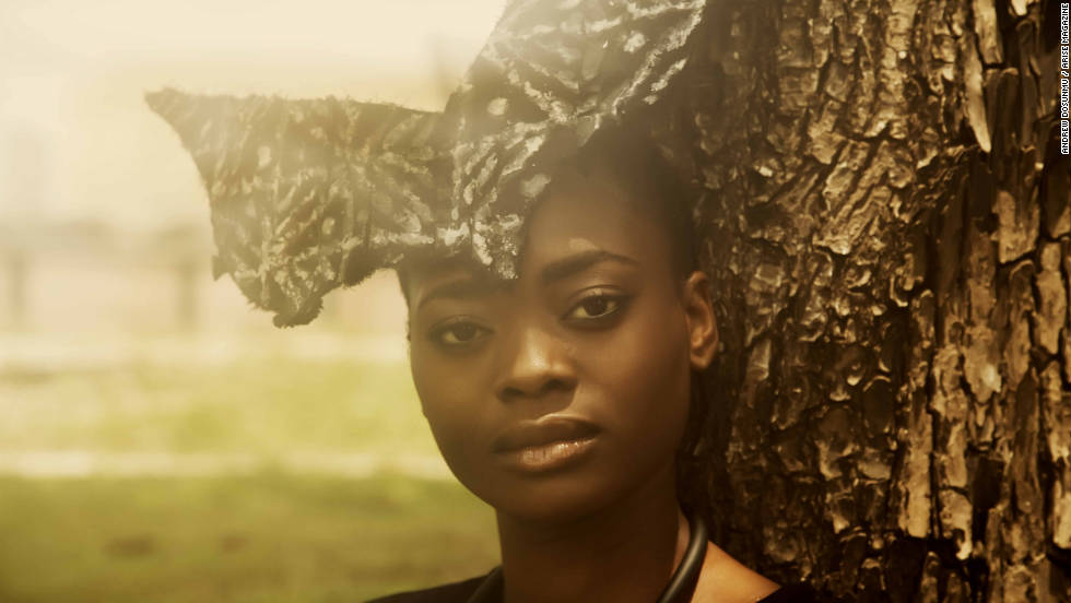 A model displays a butterfly shaped head piece from the Maki Oh collection of Nigerian designer, Amaka Osakwe.