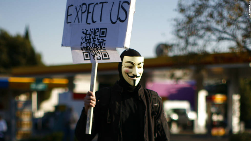 A masked demonstrator marches in Oakland, California on November 2.