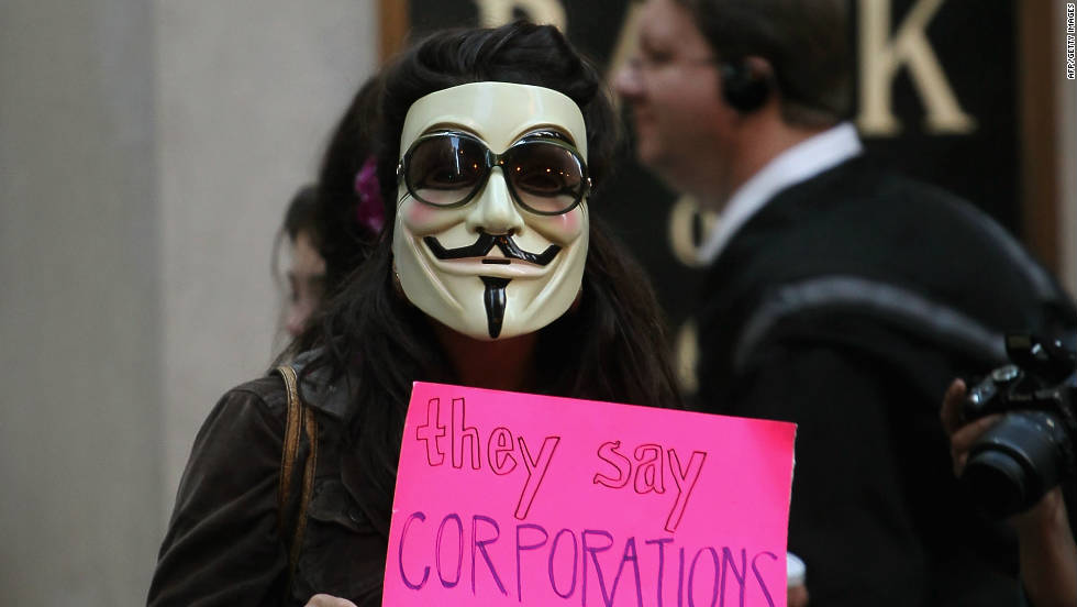 An Occupy demonstrator protests outside the Federal Reserve Bank on October 3 in Chicago.