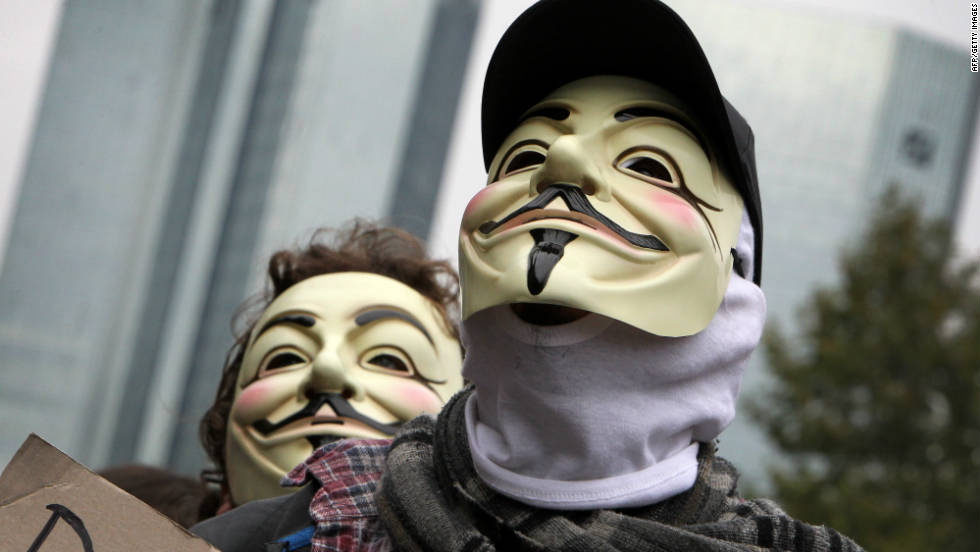 Masked protesters march in Frankfurt, Germany on October 29.