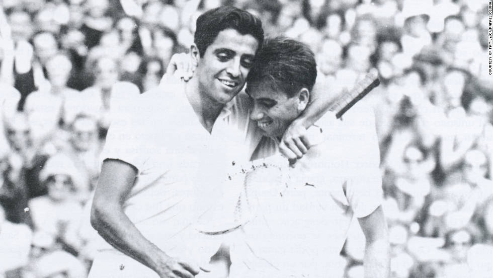 Rafael Osuna congratulates 1966 Wimbledon winner Manuel Santana of Spain after losing to him at the All England Club.