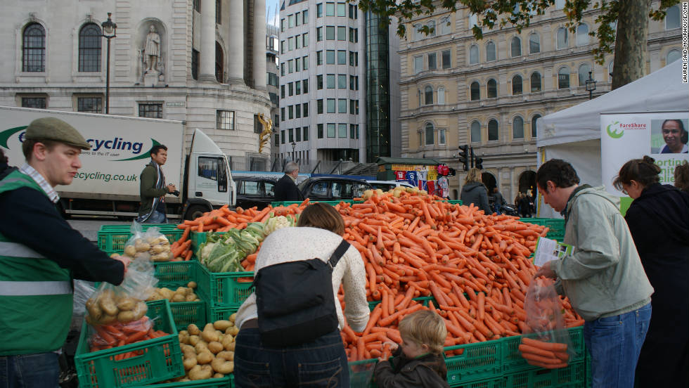 Members of the public were asked to work at the &quot;wonky veg stall&quot; where they helped sort and bag surplus vegetables for delivery to charity partners in London. 