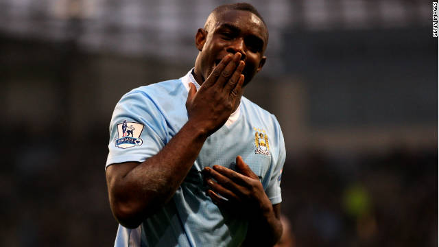 Micah Richards celebrates after scoring Manchester City&#39;s second goal against Newcastle United on Saturday.