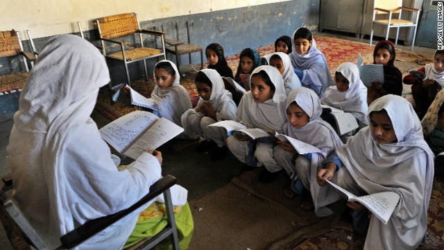 A female teacher gives a lesson at a girl&#39;s school in the main town of Swat valley, Pakistan on August 1, 2009.