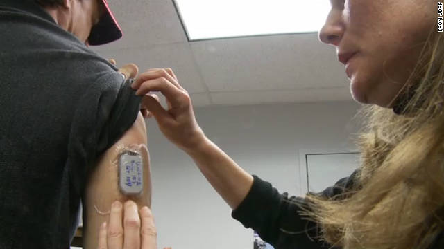 A trial patient for the Juvenile Diabetes Research Foundation&#39;s Artificial Pancreas Project tests the device. 