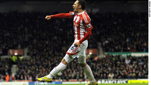 Matthew Etherington celebrates his second goal as Stoke ended Tottenham&#39;s winning run with a 2-1 success.