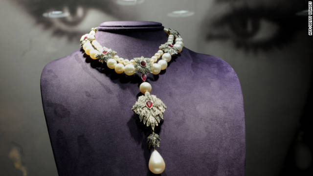 La Peregrina, a Cartier necklace from the Elizabeth Taylor collection, sits on display at Christie&#39;s Auction House in New York.