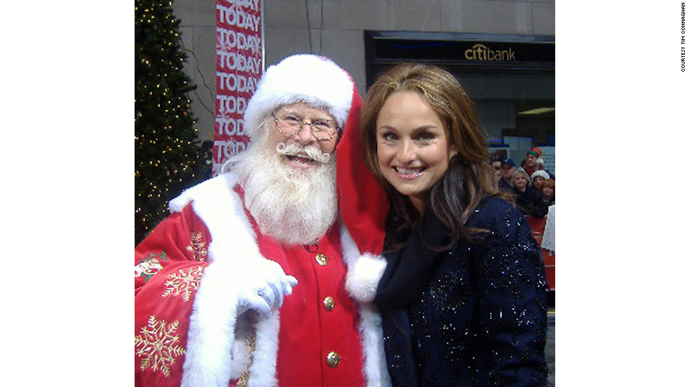 Tim Connaghan, seen here with chef and TV personality Giada De Laurentiis, is in the business of selling Santa. Not only is he out there, he&#39;s booking gigs for up to 2,000 others. 