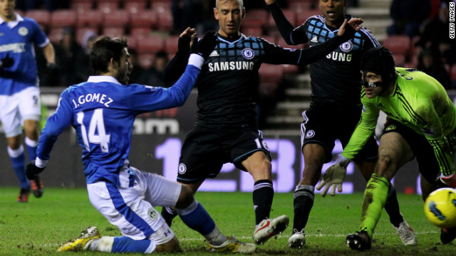 Jordi Gomez scores Wigan&#39;s equalizer against Chelsea at the DW Stadium on Saturday.