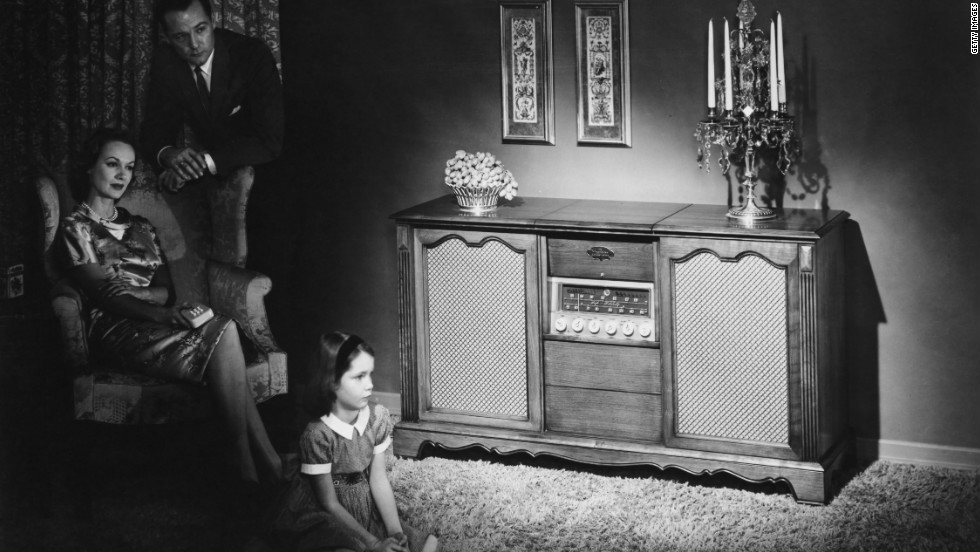 A family listens to a Magnavox Concert Grand radio in their home. Hit radio programs &quot;Suspense&quot; and &quot;Yours Truly, Johnny Dollar&quot; aired the last broadcasts in 1962. Many would say this ended the &quot;Golden Age of Radio.&quot;