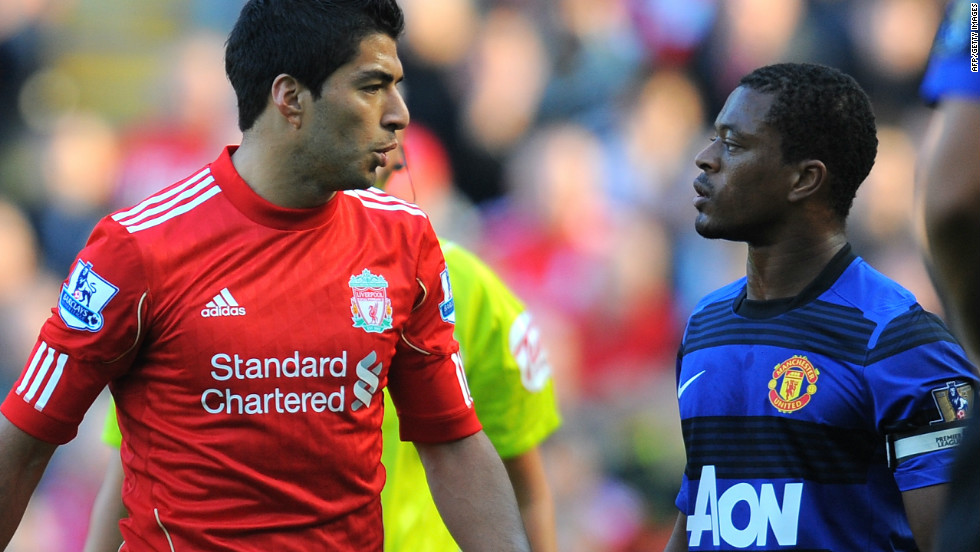 Liverpool striker Luis Suarez was handed an eight-match ban by the English Football Association for racially abusing Manchester United&#39;s Patrice Evra in a match in October 2011. Suarez refused to shake Evra&#39;s hand during the customary pre-match ritual ahead of the teams&#39; clash on February 12 this year. The Uruguayan has since apologized for his snub of the France defender.