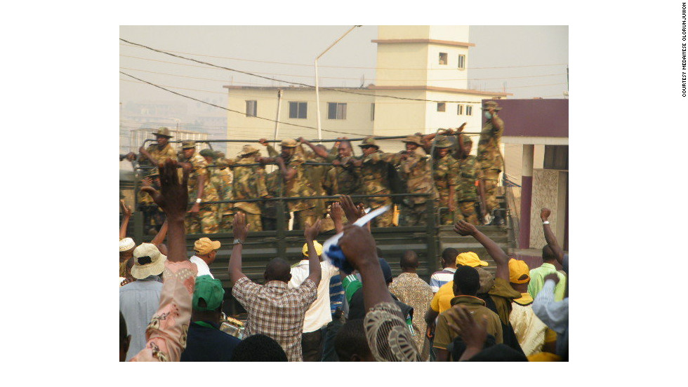 This picture, taken by iReporter Medaiyese Olorunjuwon shows the armed forces monitoring protesters in the city of Ilorin, Kwara State capital. Olorunjuwon said: &quot;The protesters were cheering the armed forces... All in all it was peaceful.&quot;